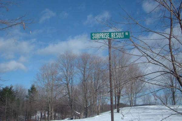 surprise result street sign