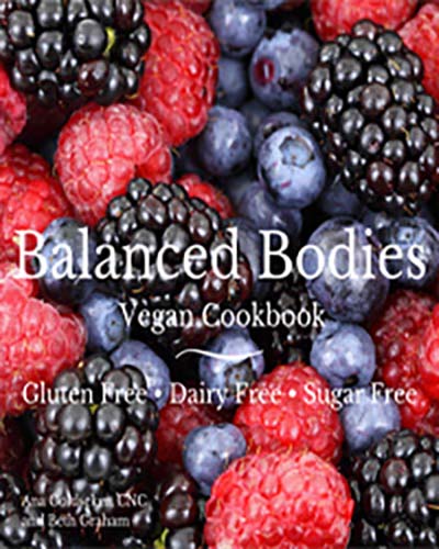 Cover for the book, Balanced Bodies. Features a close up of red raspberries, black raspberries, and blueberries.