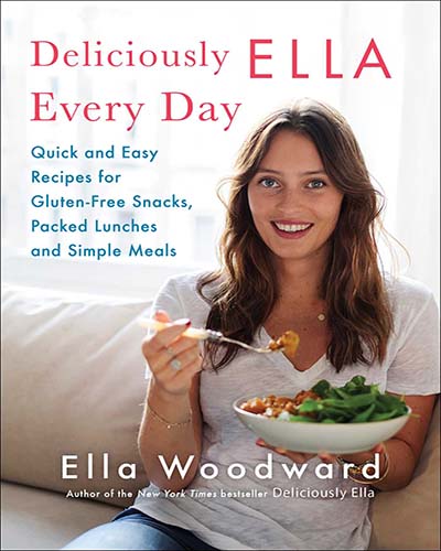 Cover for the book, Deliciously Ella Every Day. Features Ella eating a bowl of green food while sitting on a couch.