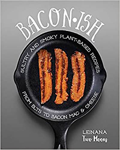 A cover for the book, Baconish. Features a grey background with an iron skillet in the middle with three vegan bacon strips inside.