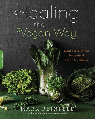 Cover for the book, Healing the Vegan Way. Featuring an assortment of vegetables with a dark black background.