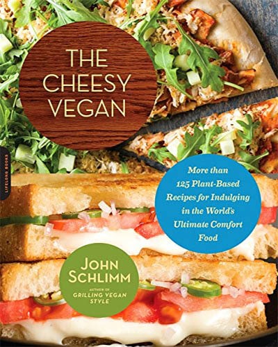 Cover for the book, The Cheesy Vegan. Features a closeeup of a sandwich and a pizza.