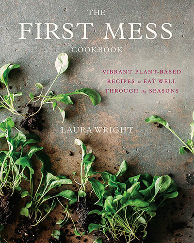 Cover of the book, The First Mess. Features a grey countertop with green herbs in one corner.