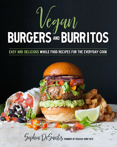 Cover for the book Vegan Burgers & Burritos. Features a closeup of a huge vegan burger with a black background.
