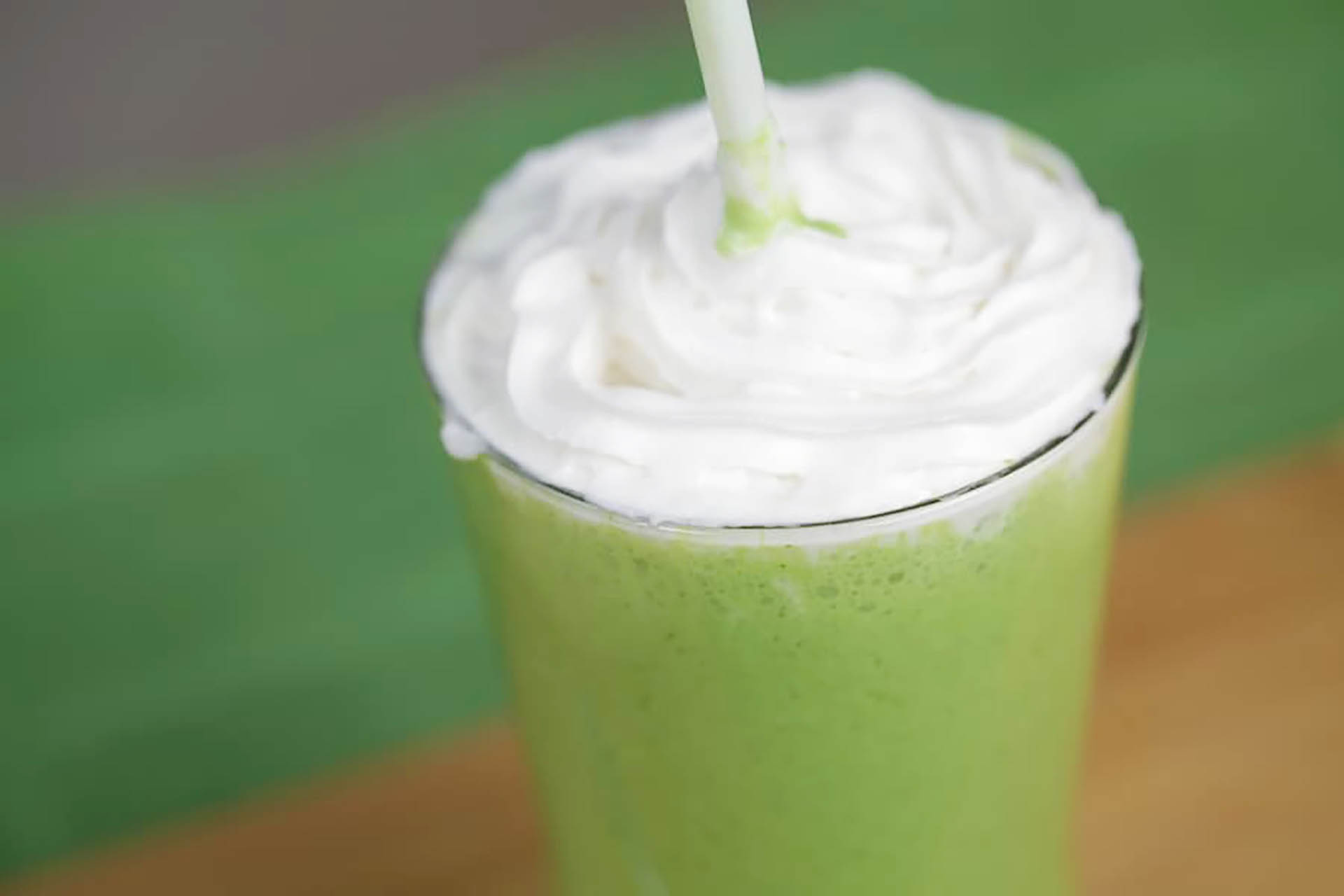 A shamrock shake with whipped topping