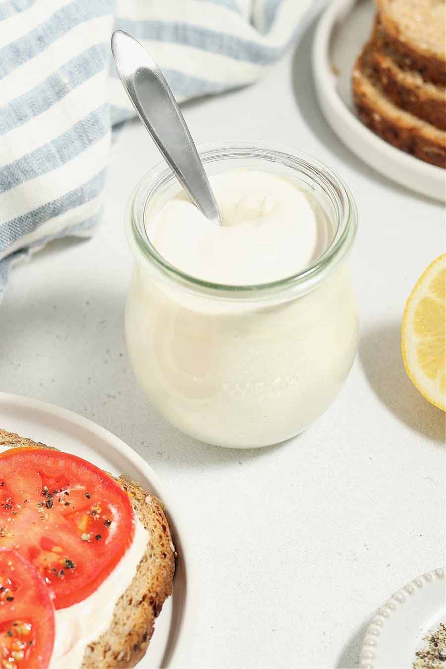 Vegan mayo in a jar on a table